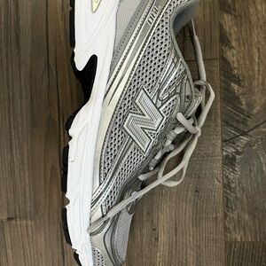 New Balance Silver and White Athletic Sneakers